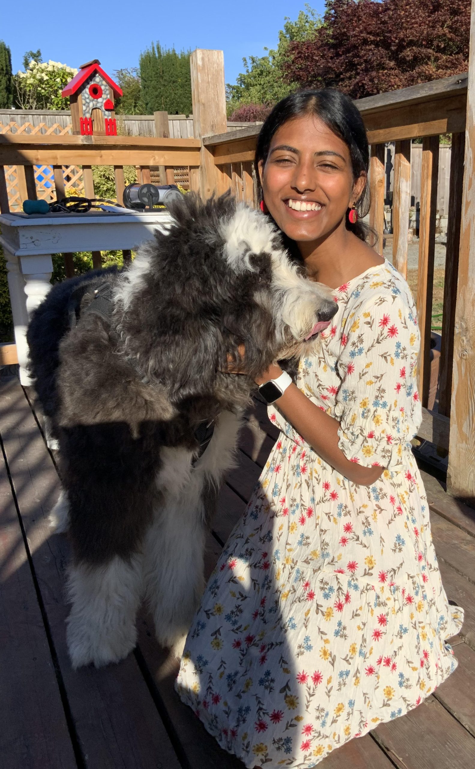 Akshaya's Picutred with her dog, Herki